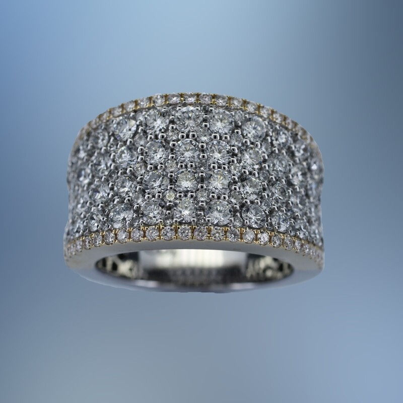 ONE 14KT WHITE AND YELLOW GOLD LADIES WEDDING BAND CONTAINING 172 NATURAL ROUND BRILLIANT CUT DIAMONDS TOTALING 2.87 CTS.