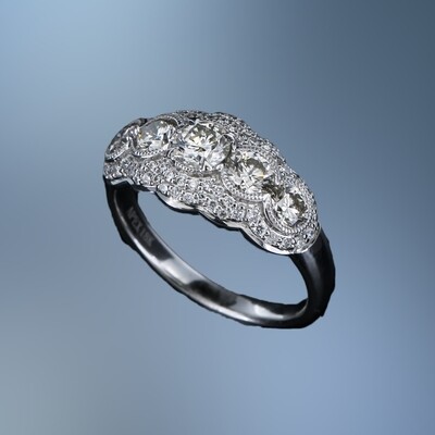 18K WHITE GOLD DIAMOND RING FEATURING NATURAL ROUND BRILLIANT CUT DIAMONDS TOTALING 1.53 CTS