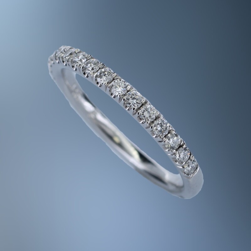 14K WHITE GOLD PRONG SET DIAMOND WEDDING BAND FEATURING 16 ROUND BRILLIANT DIAMONDS TOTALING  0.35 CTS