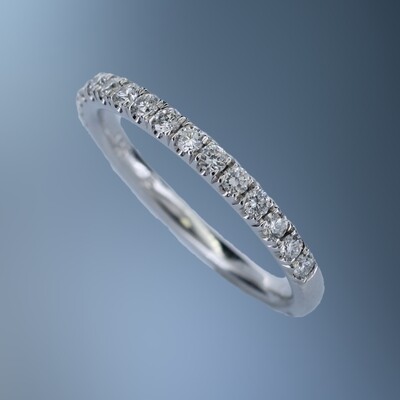 14K WHITE GOLD PRONG SET DIAMOND WEDDING BAND FEATURING 16 ROUND BRILLIANT DIAMONDS TOTALING 0.35 CTS
