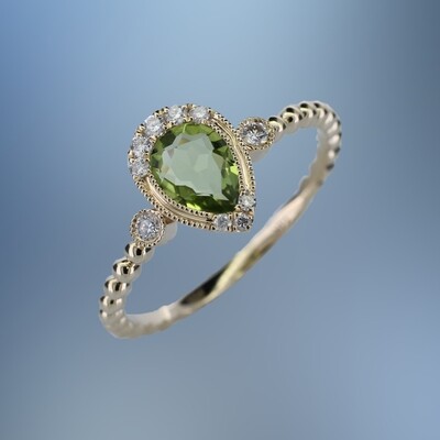14KT YELLOW GOLD LADIES PERIDOT AND DIAMOND RING