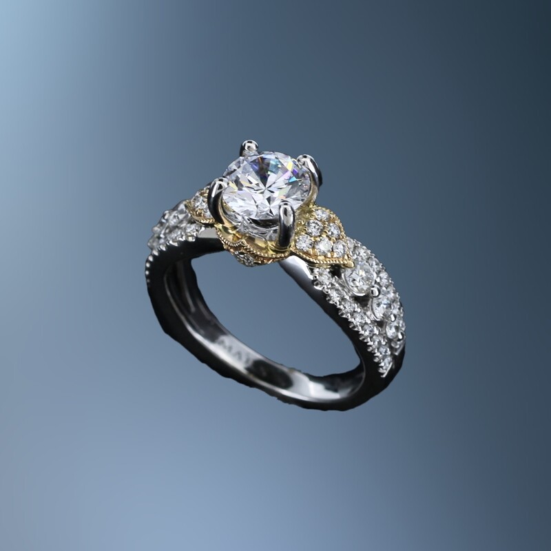 14KT TWO TONE ENGAGEMENT RING FEATURING  52 ROUND BRILLIANT CUT DIAMONDS TOTALING 0.70 CTS.