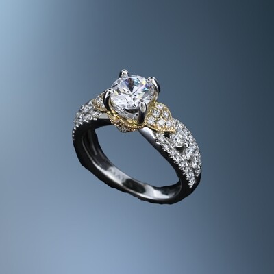 14KT TWO TONE ENGAGEMENT RING FEATURING 52 ROUND BRILLIANT CUT DIAMONDS TOTALING 0.70 CTS.