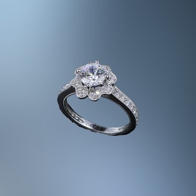 14KT WHITE GOLD HALO ENGAGEMENT RING CONTAINING 48 ROUND BRILLIANT CUT DIAMONDS TOTALING 0.58 CTS