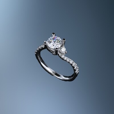 14KT WHITE GOLD ENGAGEMENT RING FEATURING 18 ROUND BRILLIANT CUT DIAMONDS TOTALING 0.35 CTS.