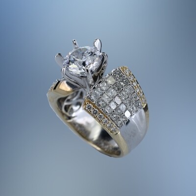 14 KT TWO TONE GOLD ENGAGEMENT RING FEATURING 74 ROUND BRILLIANT & PRINCESS CUT DIAMONDS TOTALING 2.01 CTS