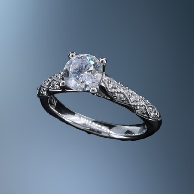 14KT WHITE GOLD ENGAGEMENT RING FEATURING 14 ROUND BRILLIANT CUT DIAMONDS TOTALING 0.20 CTS