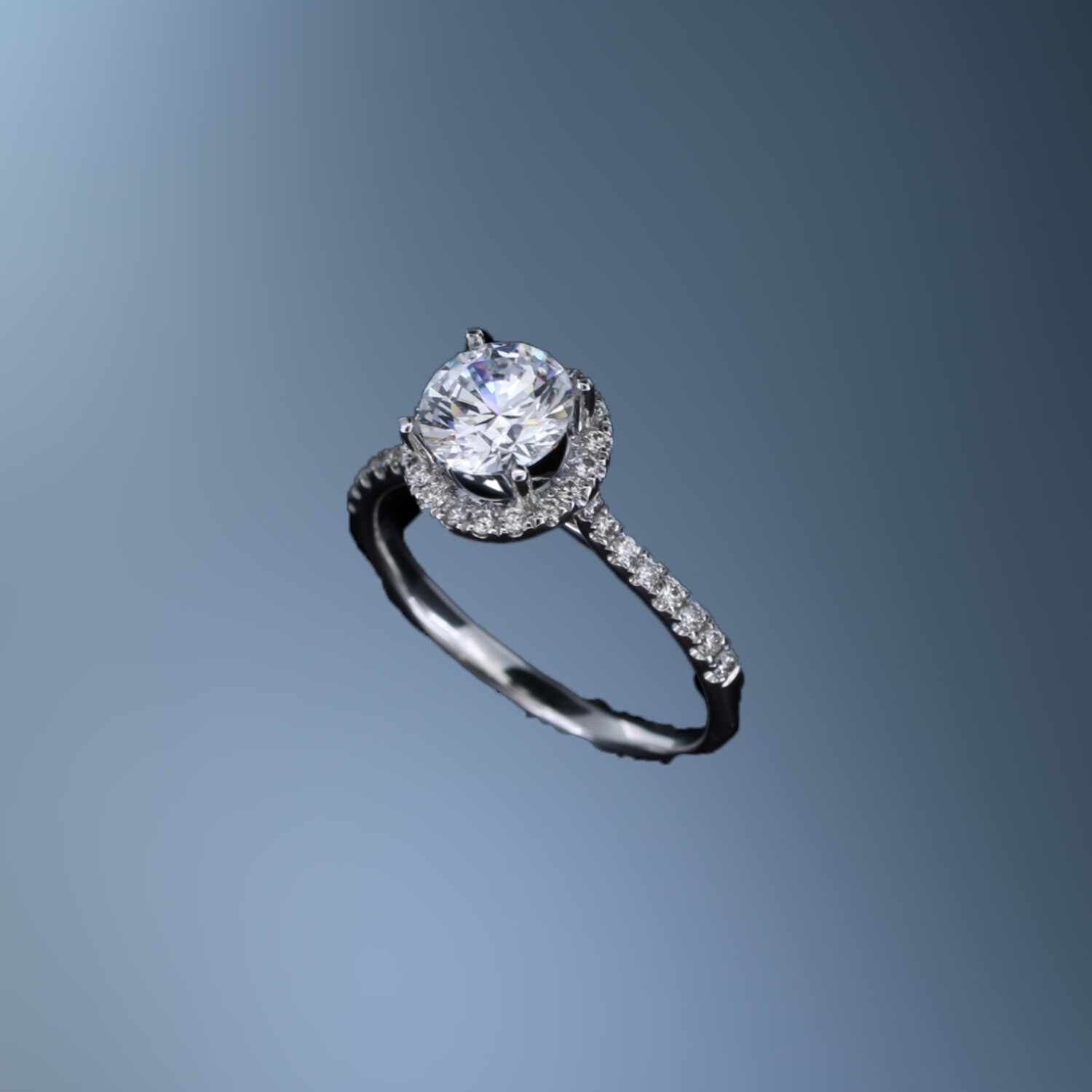 ​14KT WHITE GOLD HALO ENGAGEMENT RING FEATURING 34 ROUND BRILLIANT CUT DIAMONDS TOTALING 0.24 CTS.