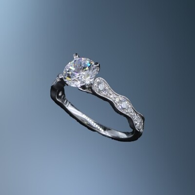 14KT WHITE GOLD ENGAGEMENT RING FEATURING 22 ROUND BRILLIANT CUT DIAMONDS TOTALING .17CTS