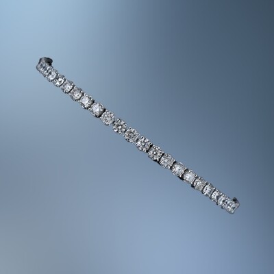 14KT WHITE GOLD LADIES TENNIS BRACELET FEATURING 51 ROUND BRILLIANT CUT LAB GROWN DIAMONDS TOTALING 7.00 CTS