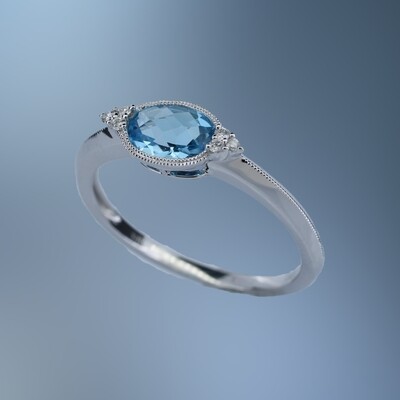 ONE 14KT WHITE GOLD LADIES BLUE TOPAZ AND DIAMOND RING
