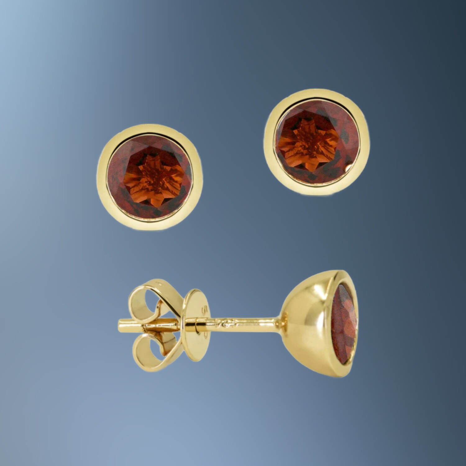 14 KARAT YELLOW GOLD BEZEL SET GARNETS STUD EARRINGS CONTAINING TWO ROUND GARNETS TOTALING 1.31 CARATS 14 KARAT YELLOW GOLD BEZEL SET GARNETS STUD EARRINGS CONTAINING TWO ROUND GARNETS TOTALING 1.31 CARATS