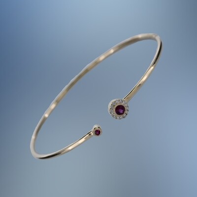 ONE 14KT YELLOW GOLD OPEN BANGLE BRACELET CONTAINING .24 CT OF NATURAL ROUND BRILLIANT CUT RUBIES AND .10 CT. OF NATURAL ROUND BRILLIANT CUT DIAMONDS