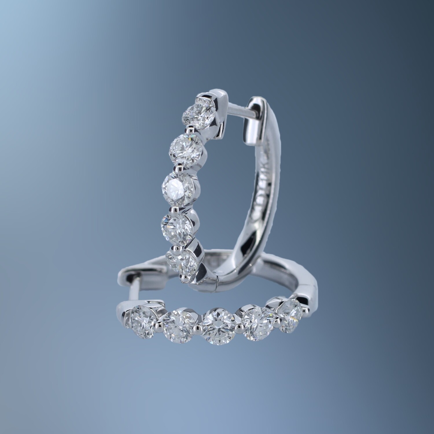 ONE PAIR OF 14KT WHITE GOLD DIAMOND HOOPS CONTAINING 1.00 CT OF NATURAL ROUND BRILLIANT CUT DIAMONDS WITH A HINGE BACK