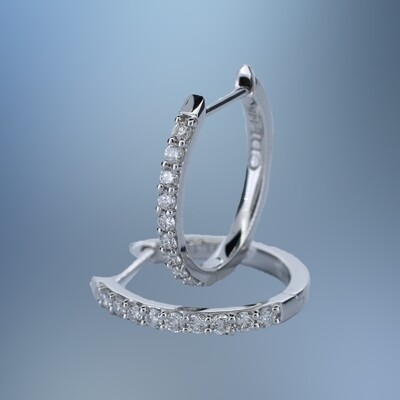 ONE PAIR OF 14KT WHTE GOLD DIAMOND HOOPS CONTAINING .29 CT OF NATURAL ROUND BRILLIANT CUT DIAMONDS WITH A HINGE BACK ONE PAIR OF 14KT WHTE GOLD DIAMOND HOOPS CONTAINING .29 CT OF NATURAL ROUND BRILLIANT CUT DIAMONDS WITH A HINGE BACK