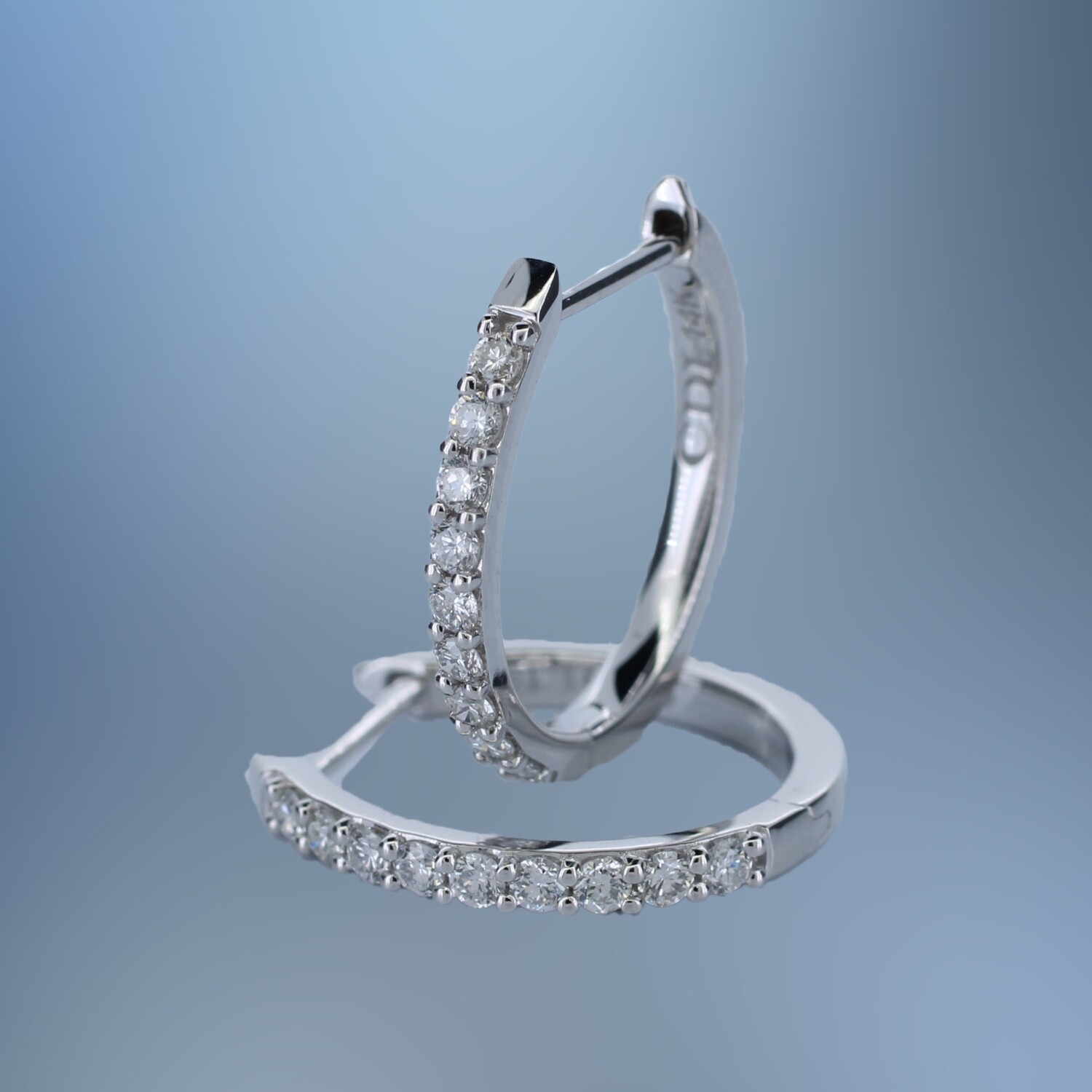 ONE PAIR OF 14KT WHITE GOLD DIAMOND HOOPS CONTAINING .18 CT OF NATURAL ROUND BRILLIANT CUT DIAMONDS WITH A HINGE BACK​ ​