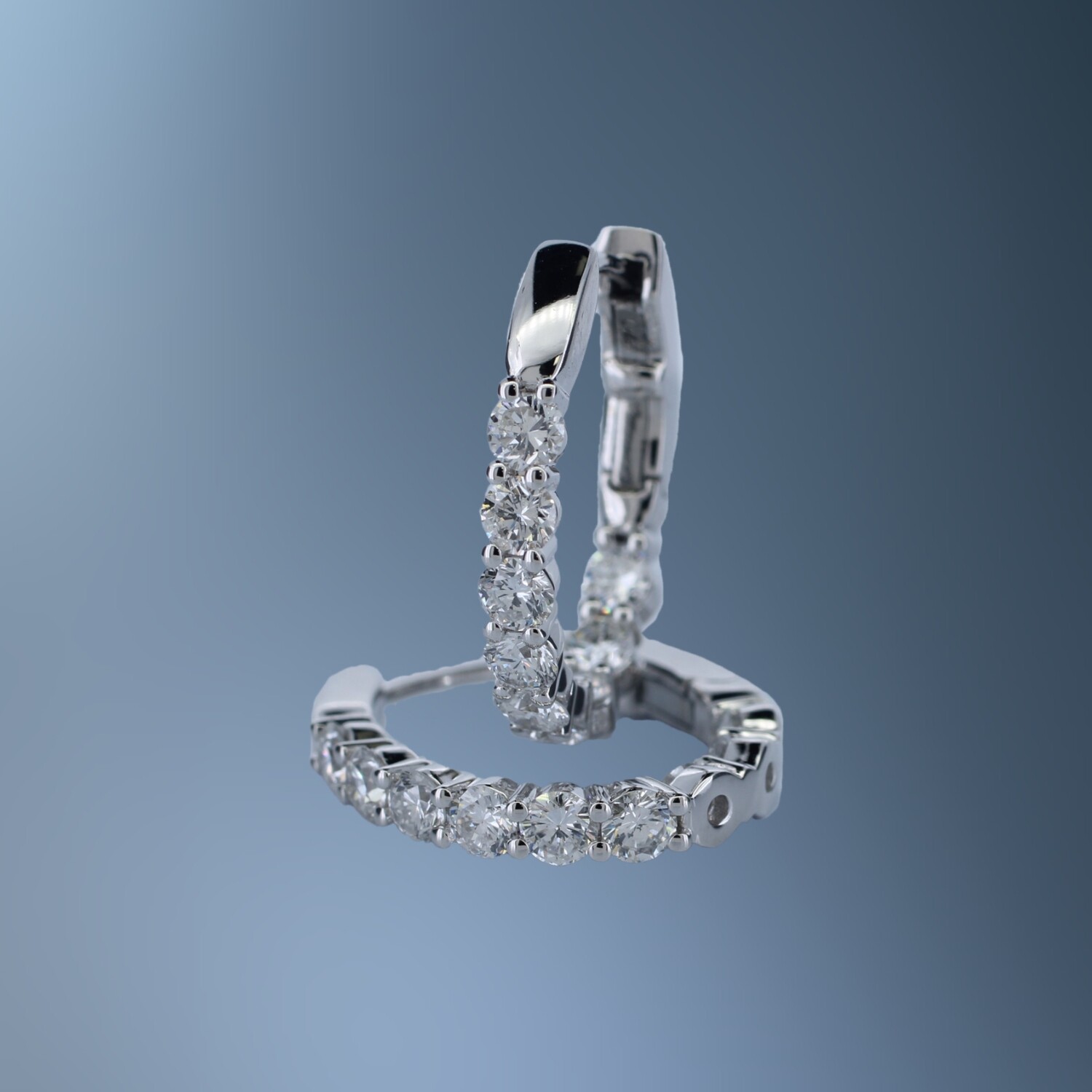 14KT WHITE GOLD INSIDE & OUT OVAL DIAMOND HOOP EARRING CONTAINING 18 NATURAL ROUND BRILLIANT DIAMONDS TOTALING 1.59 CTS