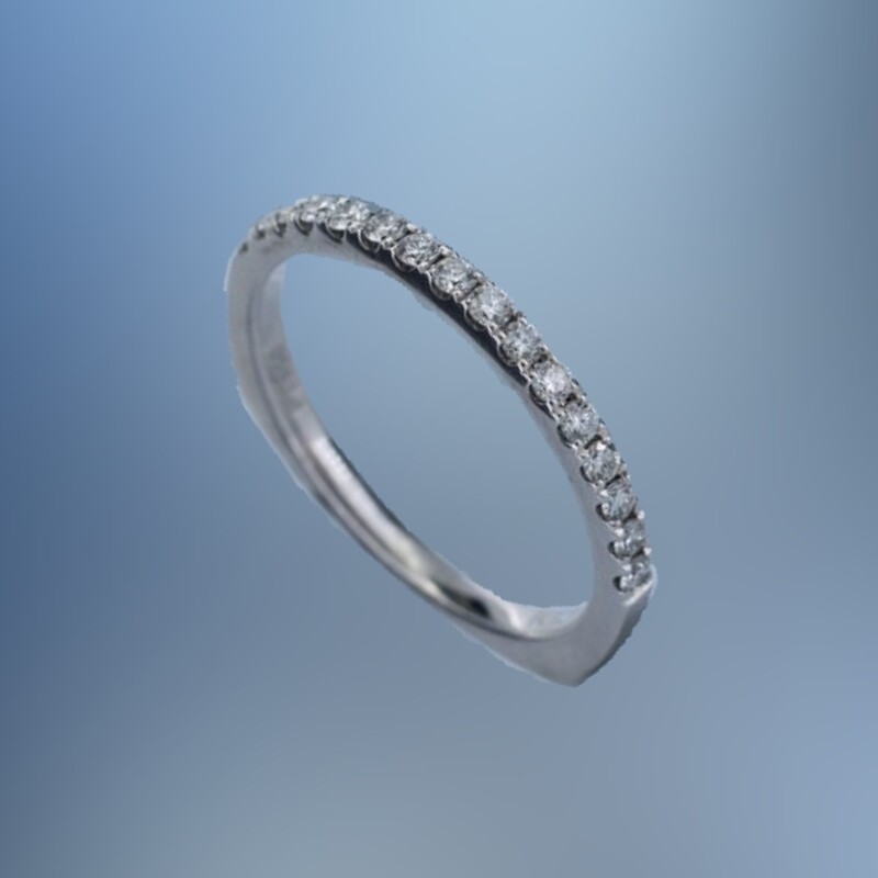 PLATINUM DIAMOND WEDDING BAND FEATURING 16 ROUND BRILLIANT CUT DIAMONDS TOTALING 0.29 CTS