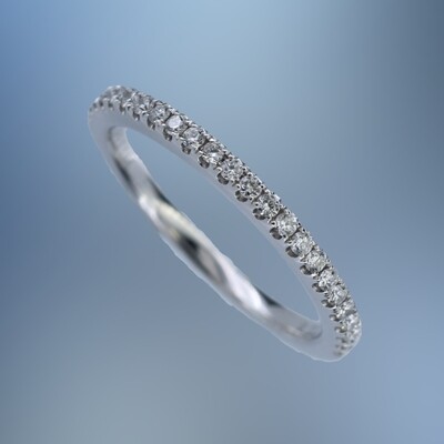 PLATINUM DIAMOND WEDDING BAND FEATURING 24 ROUND BRILLIANT CUT DIAMONDS TOTALING 0.22 CTS