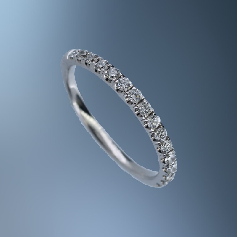 14KT WHITE GOLD DIAMOND WEDDING BAND FEATURING  16 ROUND BRILLIANT DIAMONDS TOTALING 0.35 CTS