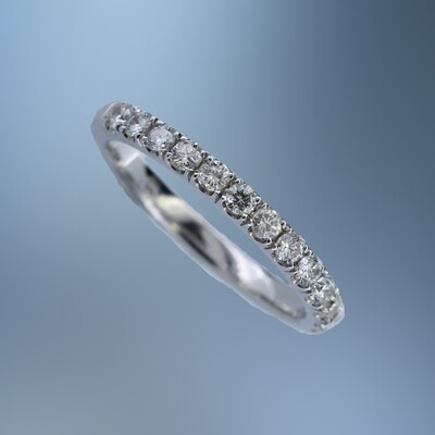 14KT WHITE GOLD DIAMOND WEDDING BAND FEATURING 13 ROUND BRILLIANT CUT DIAMONDS TOTALING 0.43 CTS