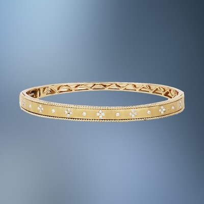 ONE 14KT YELLOW GOLD LADIES DIAMOND BANGLE CONTAINING .31 CTS. OF NATURAL ROUND BRILLIANT CUT DIAMONDS.