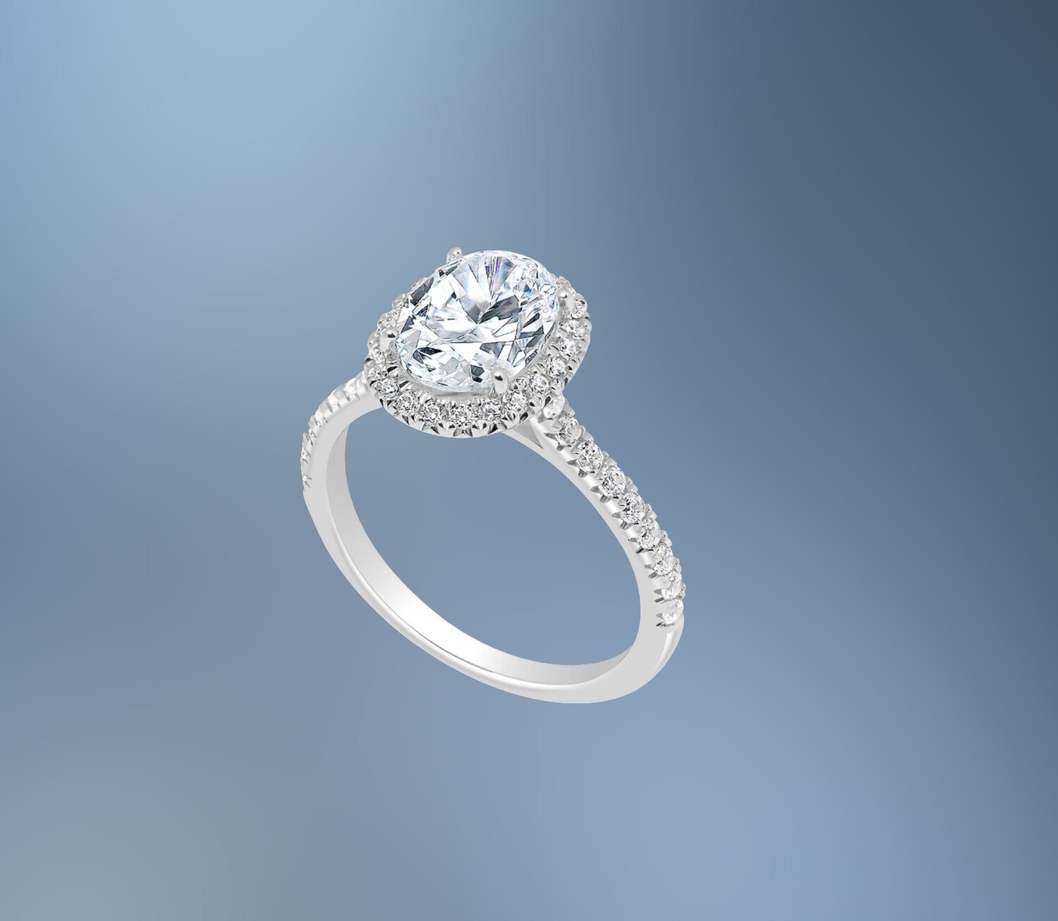14KT WHITE GOLD OVAL HALO ENGAGEMENT RING FEATURING 40 ROUND BRILLIANT DIAMONDS TOTALING .43 CTS