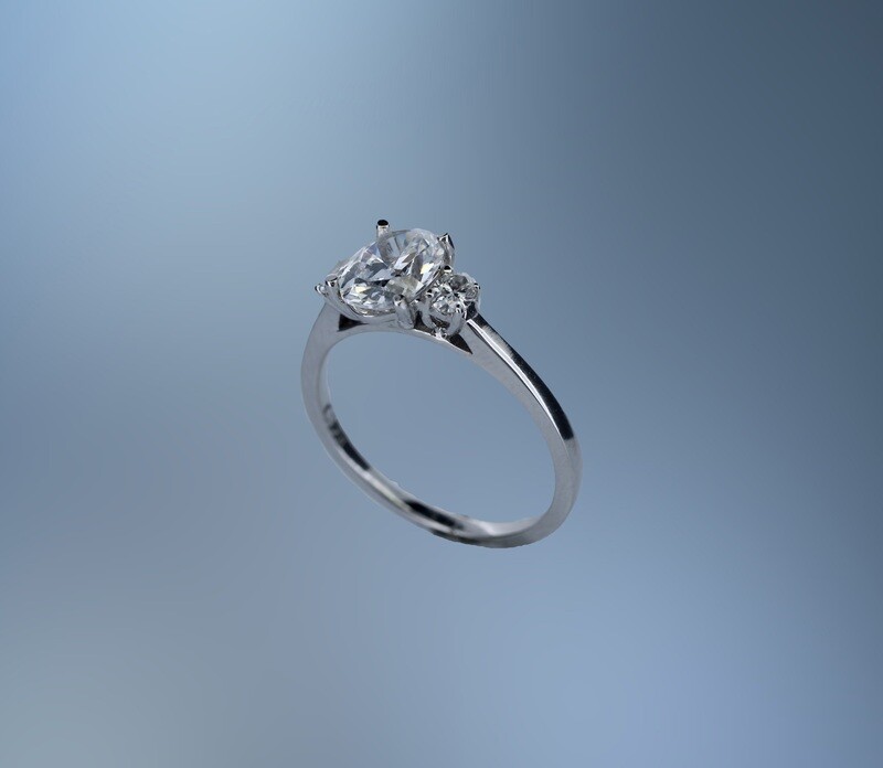 14KT WHITE GOLD ENGAGEMENT RING FEATURING  2 OVAL DIAMONDS TOTALING .18 CTS