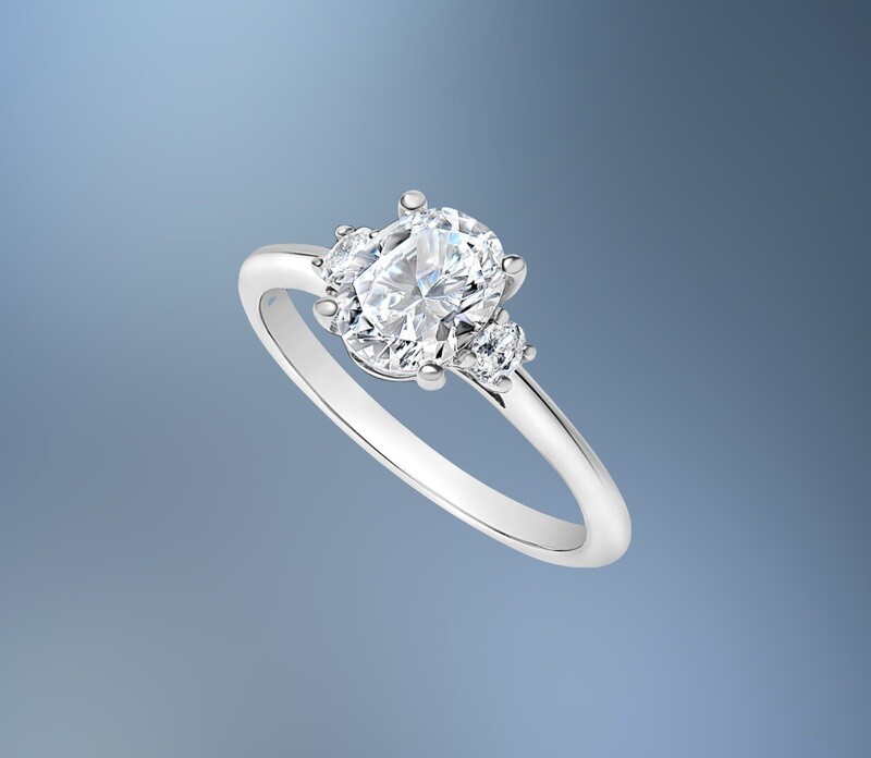 14KT WHITE GOLD OVAL ENGAGEMENT RING FEATURING  TWO OVAL DIAMONDS TOTALING .11 CTS