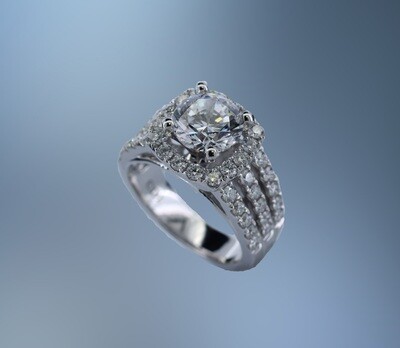 14 KT WHITE GOLD HALO STYLE ENGAGEMENT RING FEATURING 46 ROUND BRILLIANT CUT DIAMONDS TOTALING 1.22 CTS.