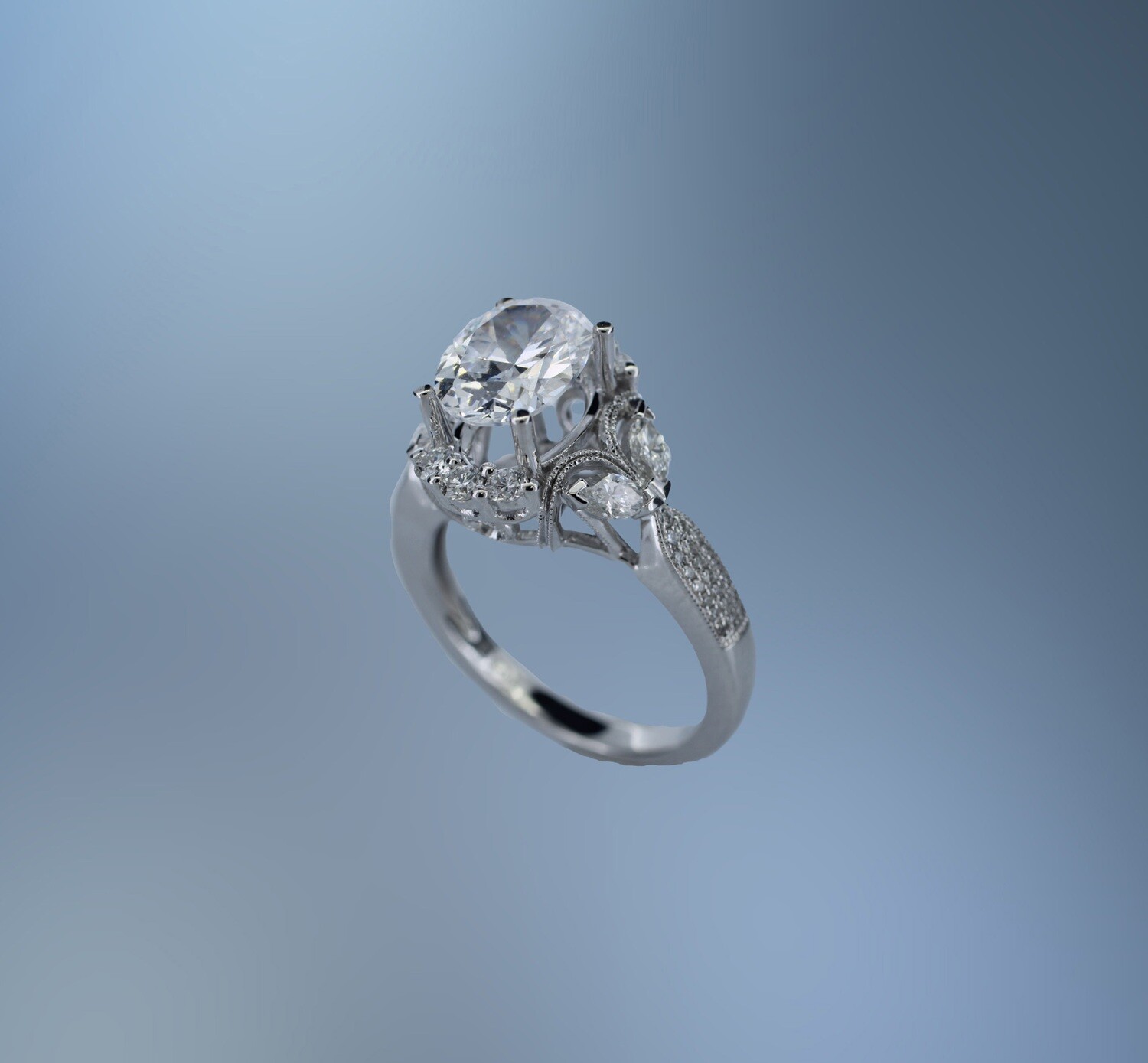 ONE 14 KARAT WHITE GOLD ENGAGEMENT RING