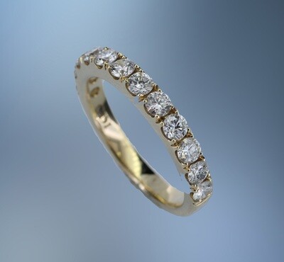14KT YELLOW GOLD DIAMOND WEDDING BAND FEATURUING 12 ROUND BRILLIANT CUT DIAMONDS TOTALING 1.04 CTS