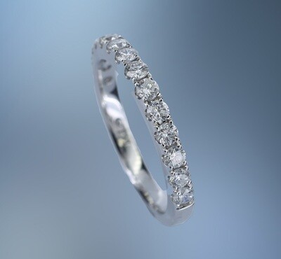 14KT WHITE GOLD DIAMOND WEDDING BAND FEATURING 15 ROUND BRILLIANT CUT DIAMONDS TOTALING 0.71 CTS
