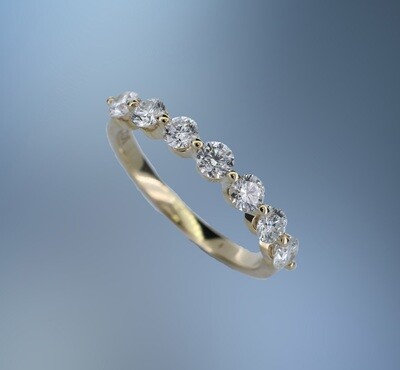 14KT YELLOW GOLD DIAMOND WEDDING BAND FEATURING 7 ROUND BRILLIANT DIAMONDS TOTALING 0.74 CTS