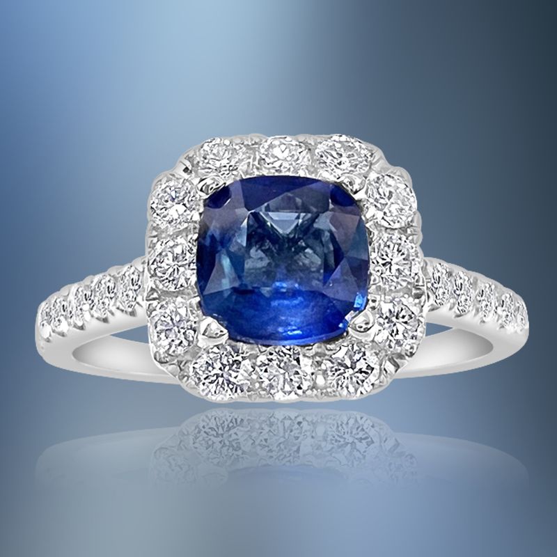 ONE 14KT WHITE GOLD LADIES DIAMOND AND BLUE SAPPHIRE RING