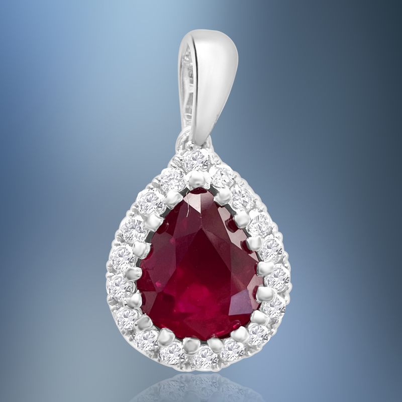 ONE 14KT WHITE GOLD DIAMOND AND RUBY PENDANT