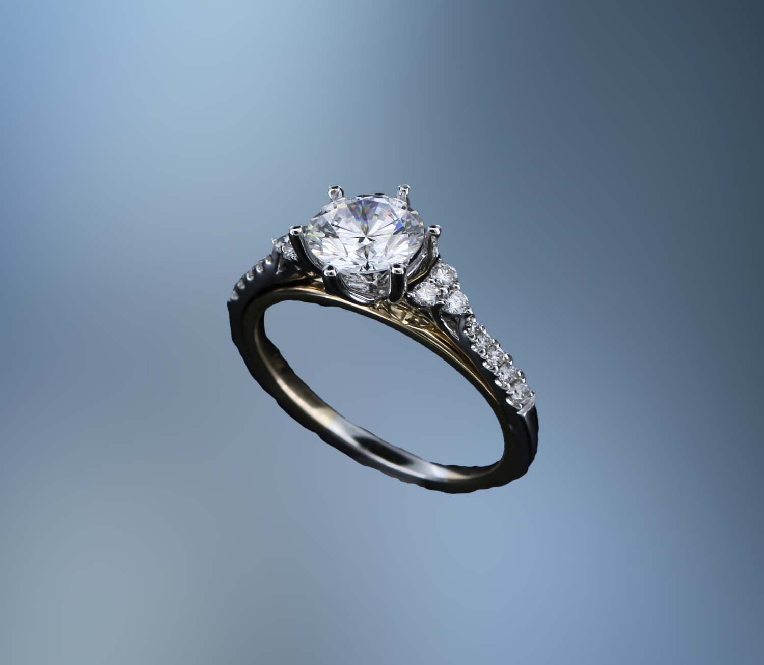 14KT TWO TONE ENGAGEMENT RING FEATURING 16 ROUND BRILLIANT DIAMONDS TOTALING 0.21CTS 14KT TWO TONE ENGAGEMENT RING FEATURING 16 ROUND BRILLIANT DIAMONDS TOTALING 0.21CTS