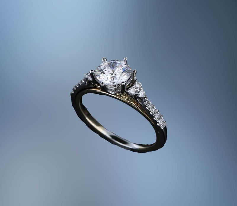 14KT TWO TONE ENGAGEMENT RING FEATURING 16 ROUND BRILLIANT DIAMONDS TOTALING 0.21CTS 14KT TWO TONE ENGAGEMENT RING FEATURING 16 ROUND BRILLIANT DIAMONDS TOTALING 0.21CTS