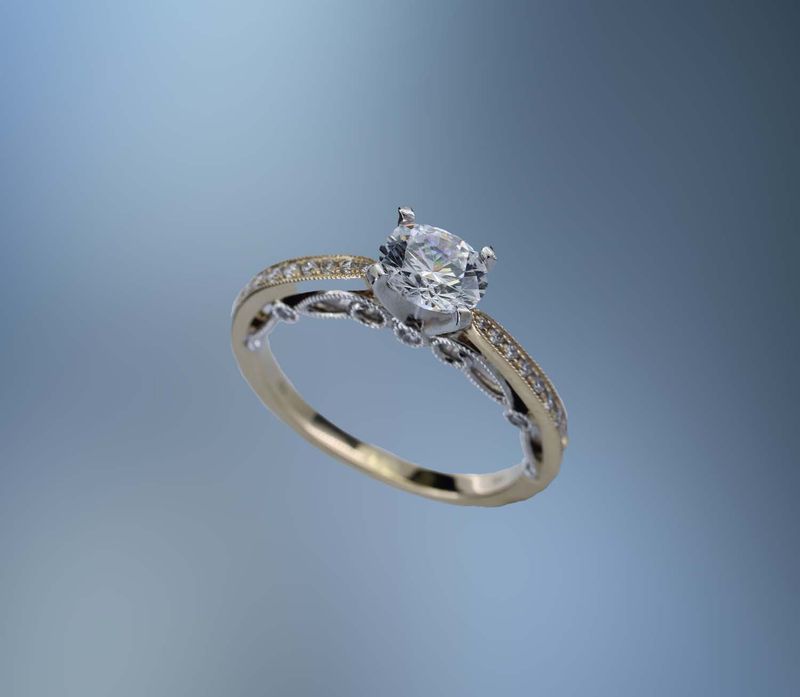 14KT TWO TONE ENGAGEMENT RING FEATURING 18 ROUND BRILLIANT DIAMONDS TOTALING 0.21 CTS 14KT TWO TONE ENGAGEMENT RING FEATURING 18 ROUND BRILLIANT DIAMONDS TOTALING 0.21 CTS