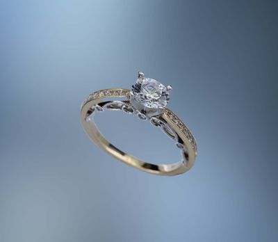14KT TWO TONE ENGAGEMENT RING FEATURING 18 ROUND BRILLIANT DIAMONDS TOTALING 0.21 CTS