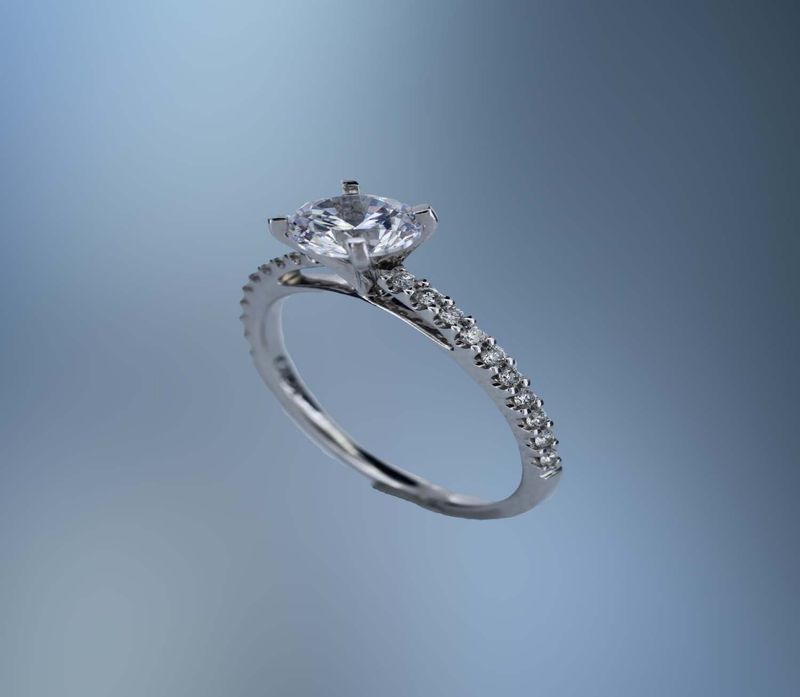 14KT WHITE GOLD ENGAGEMENT RING FEATURING 20 ROUND BRILLIANT CUT DIAMONDS TOTALING .24 CTS. 14KT WHITE GOLD ENGAGEMENT RING FEATURING 20 ROUND BRILLIANT CUT DIAMONDS TOTALING .24 CTS.
