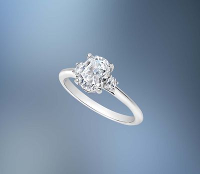 14KT WHITE GOLD OVAL ENGAGEMENT RING FEATURING TWO OVAL DIAMONDS TOTALING .11 CTS 14KT WHITE GOLD OVAL ENGAGEMENT RING FEATURING TWO OVAL DIAMONDS TOTALING .11 CTS