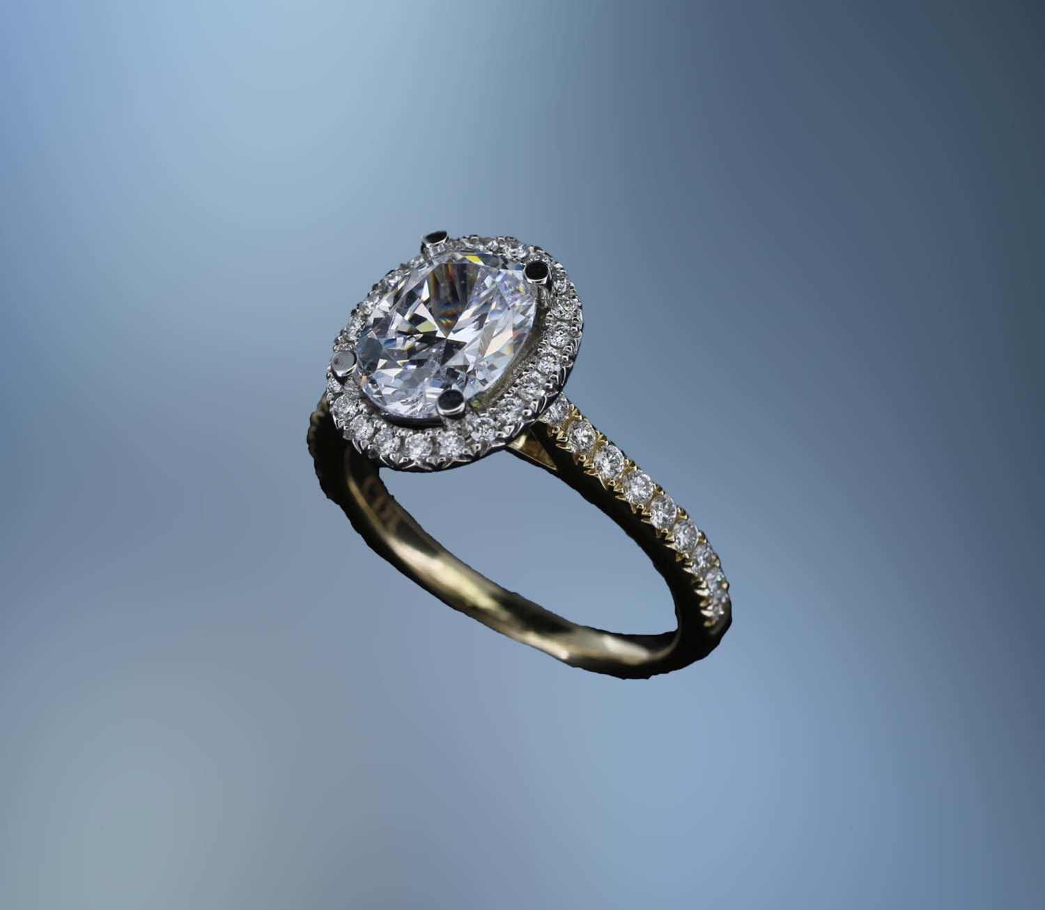 14KT YELLOW GOLD HALO ENGAGEMENT RING FEATURING 40 ROUND BRILLIANT DIAMONDS TOTALING .44 CTS 14KT YELLOW GOLD HALO ENGAGEMENT RING FEATURING 40 ROUND BRILLIANT DIAMONDS TOTALING .44 CTS