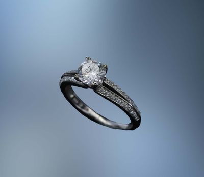 14K WHITE GOLD SEMI MOUNT W/ SPLIT SHANK & MILGRAIN EDGES FEATURING  44 ROUND BRILLIANT CUT DIAMONDS TOTALING .20 CTS