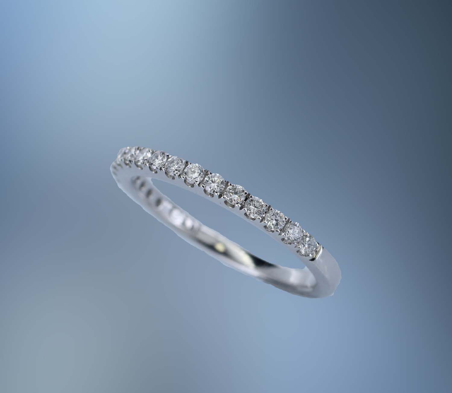 14KT WHITE GOLD DIAMOND WEDDING BAND FEATURING  18 ROUND BRILLIANT CUT DIAMONDS TOTALING 0.33 CTS