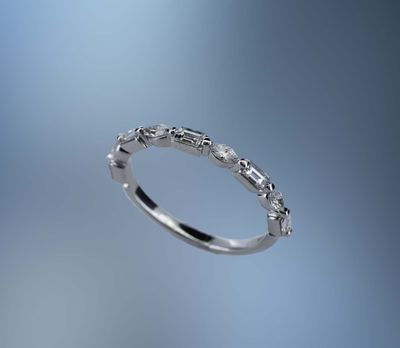 14KT WHITE GOLD LADY'S DIAMOND WEDDING BAND FEATURING 5  BAGUETTE CUT DIAMONDS  AND 4 MARQUISE CUT DIAMONDS TOTALING 0.59 CTS