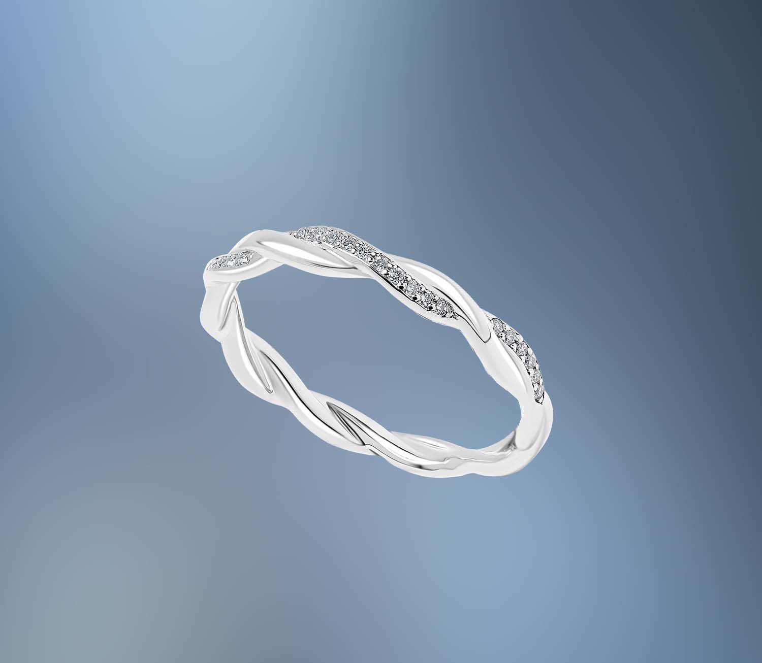 14KT WHITE GOLD WEDDING BAND FEATURING  32 ROUND BRILLIANT CUT DIAMONDS TOTALING .11 CTS