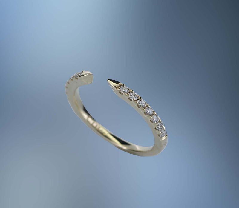 14KT YELLOW GOLD DIAMOND WEDDING BAND CONTAINING 18 ROUND BRILLIANT DIAMONDS TOTALING .26 CTS