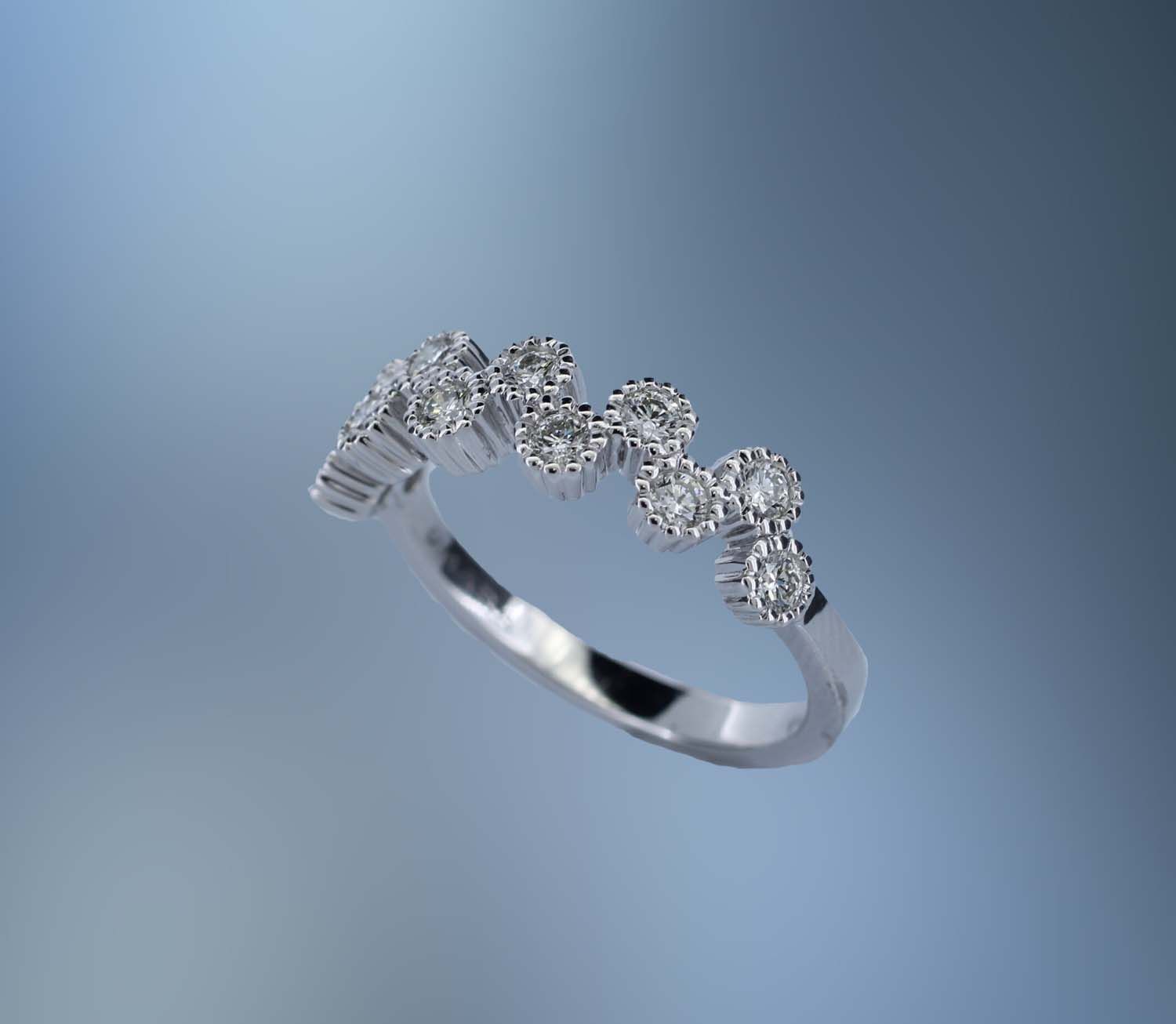 ONE 14KT WHITE GOLD LADYS NATURAL DIAMOND RING CONTAINING .47 CTS TOTAL WEIGHT OF NATURAL ROUND BRILLIANT CUT DIAMONDS ONE 14KT WHITE GOLD LADYS NATURAL DIAMOND RING CONTAINING .47 CTS TOTAL WEIGHT OF NATURAL ROUND BRILLIANT CUT DIAMONDS
