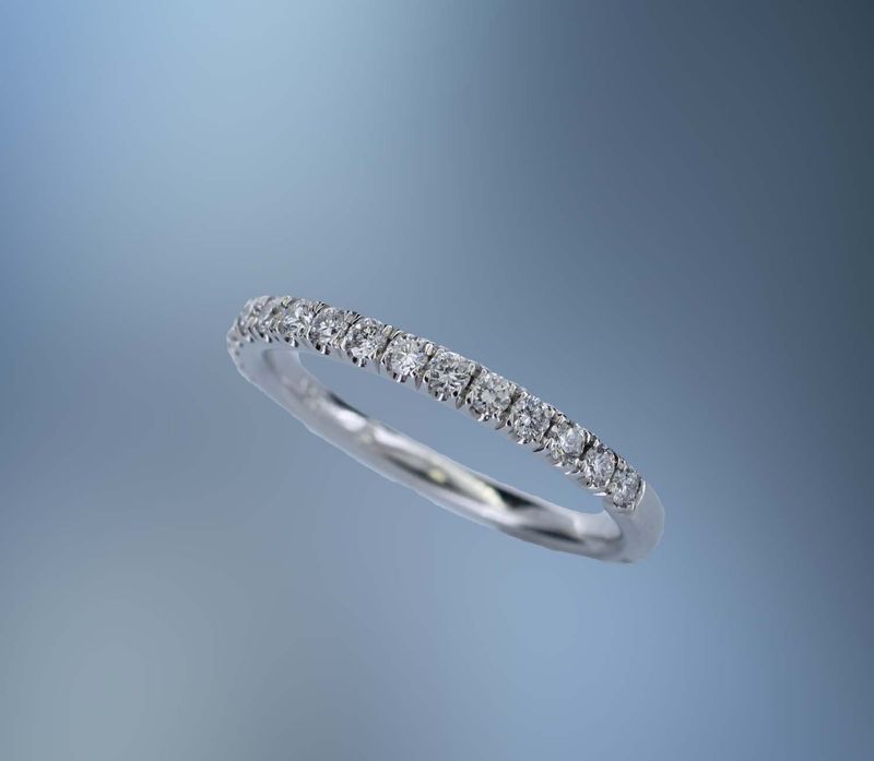 14K WHITE GOLD PRONG SET DIAMOND WEDDING BAND FEATURING 16 ROUND BRILLIANT DIAMONDS TOTALING  0.35 CTS